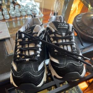 Sneakers for women or kids, mainly black, size 7.